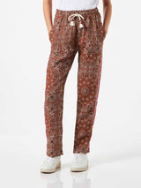 Woman linen pants with brown bandanna print